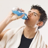 energy drink and man with towel